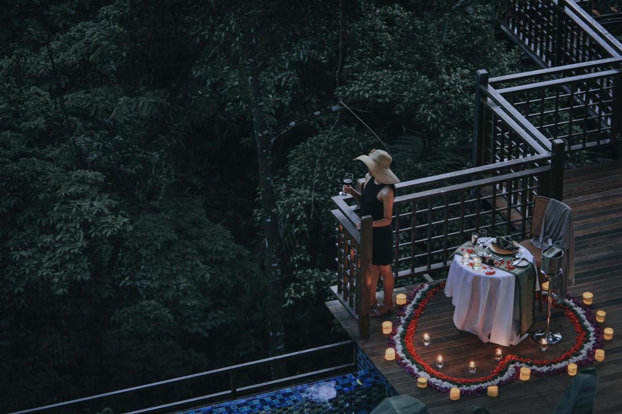 The Sebali Resort Ubud Exterior foto A woman at a romantic dinner