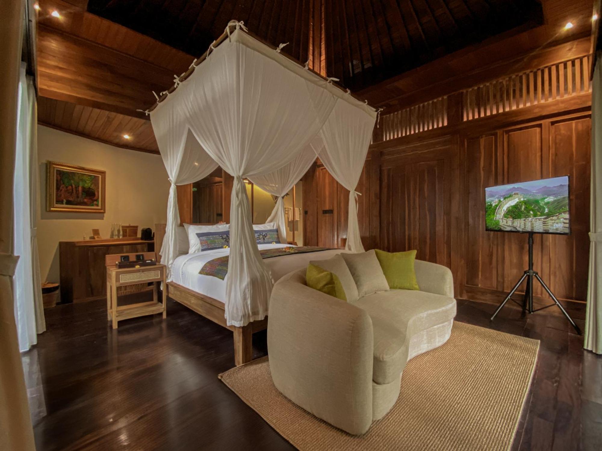 The Sebali Resort Ubud Exterior foto A bedroom at the resort