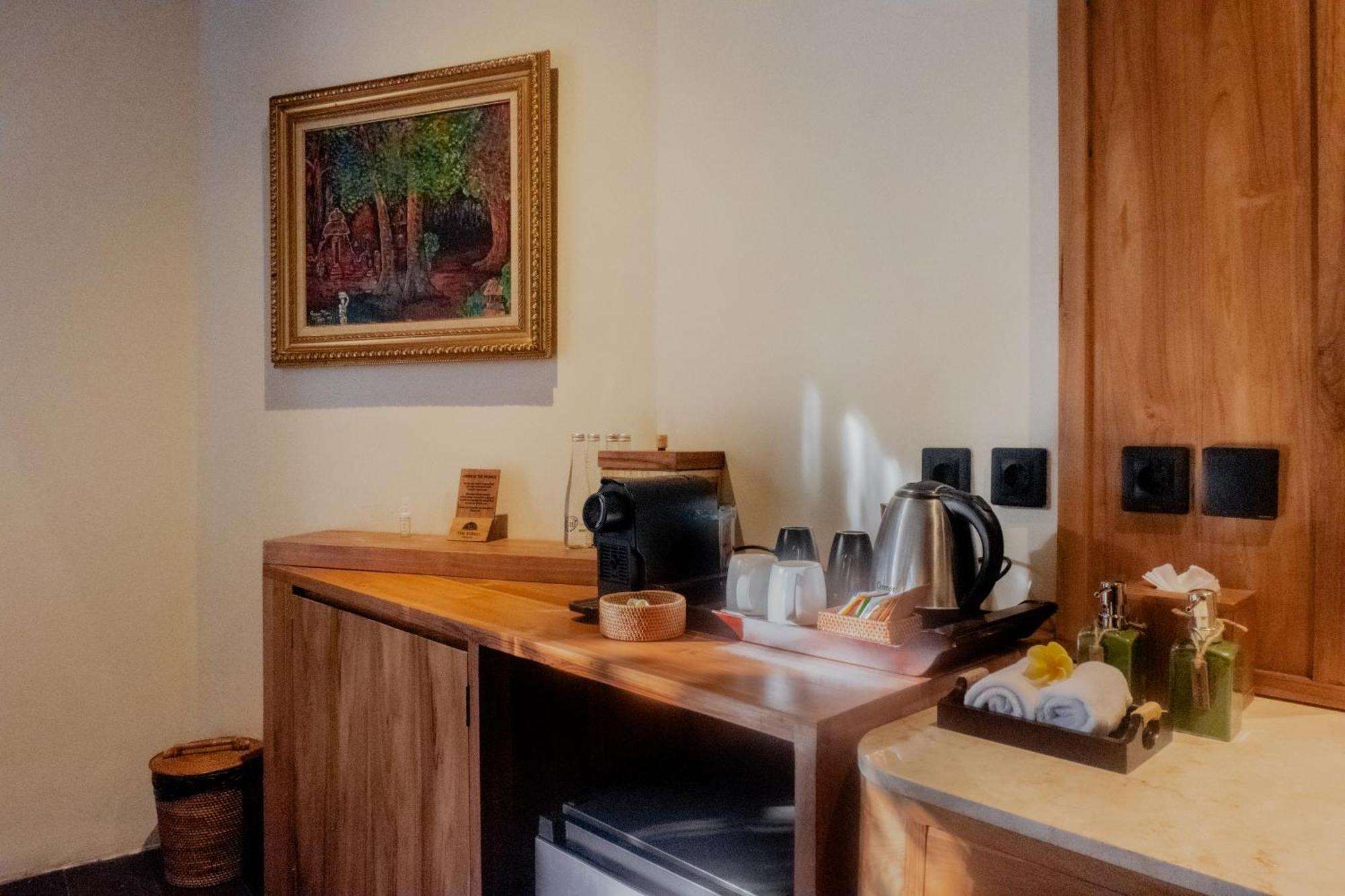 The Sebali Resort Ubud Exterior foto A Nespresso machine in a hotel room