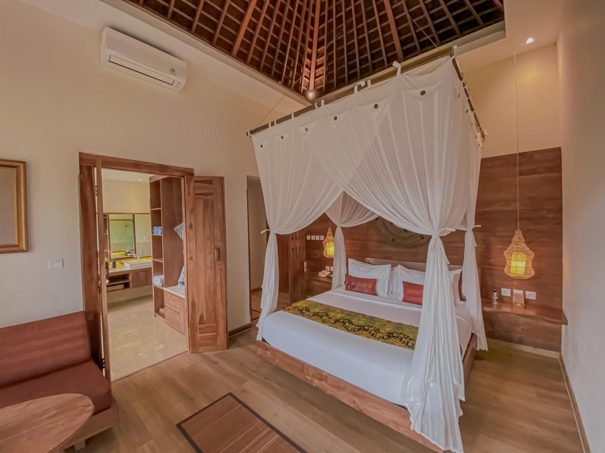 The Sebali Resort Ubud Exterior foto A bedroom at the resort